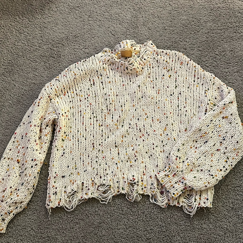 Multi colored Pom Pom sweater with tapered ends